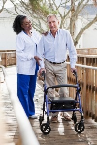 caregiver with elderly man